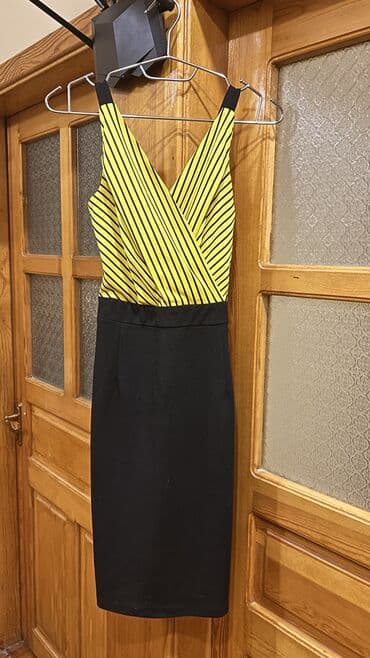 Qadın paltarı – sarı-qara zolaqlı üst, qara ətək hissəsi - Model