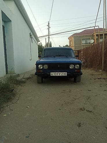 VAZ 2106, mavi rəng, sedan kuzov. Texniki xüsusiyyətlər: - Arxa