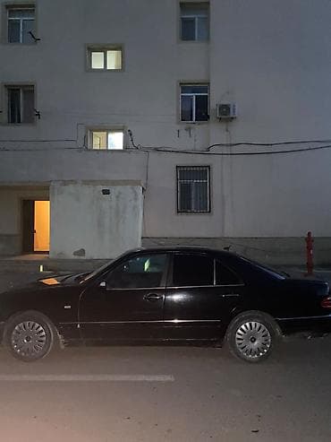 disk qabi: Mercedes-Benz E 320: 3.2 l | 1995 il Sedan — 5