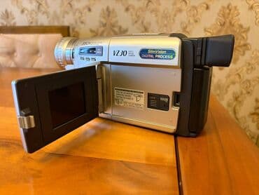 retro ev telefonu: Panasonic VHS-C video kamera - tam işlək Panasonic VHS-C video kamera — 3