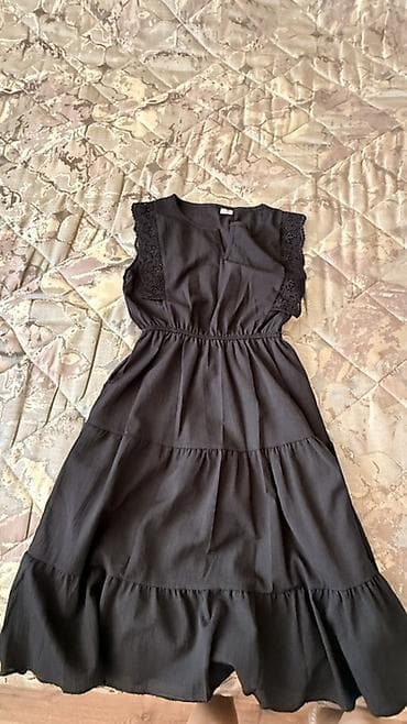 prakat donlar: Qara rəngli qadın donu - Model: Ətək hissəsi kaskad/kətəkli qatlarla — 1