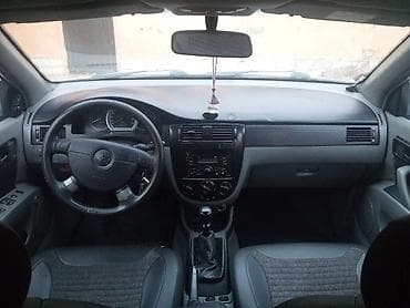 teker cixardan: Daewoo Gentra: 1.5 l | 2014 il Sedan — 9