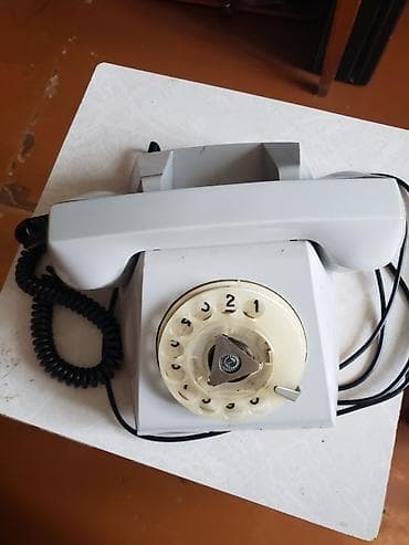 sert disk: Stasionar telefon Simli, İşlənmiş, Ünvandan götürmə — 1