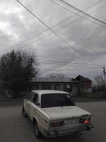 Motonəqliyyat: VAZ 2106 sedan - Kuzov: beşqapılı sedan, açıq bej rəng - Mühərrik — 4
