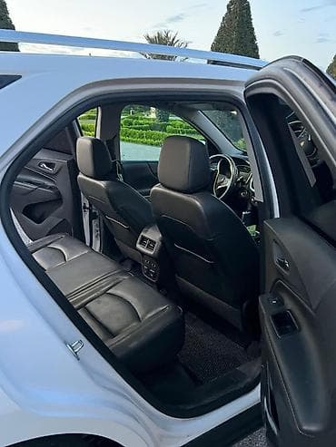 opel astra universal: Chevrolet Equinox – ağ rəngli, şəhər və uzun yol üçün rahat krossover — 9