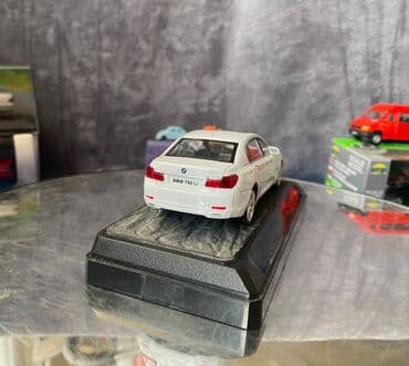 metbex tavan modelleri: Коллекционная модель BMW 750i F02 white 2008 RASTAR Scale 1:43 Art — 13