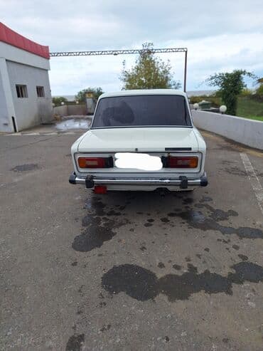 ваза стеклянная прозрачная высокая без узора: VAZ 2106 sedan - Korpus: Ağ rəng, 4 qapı, xrom ön-arka bamperlər — 17