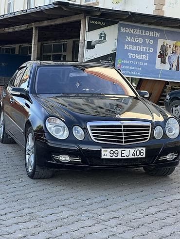 Mercedes-Benz E 220: 2.2 l | 2003 il Sedan