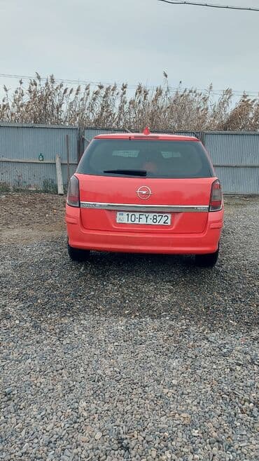 pobeda (maşın): Opel Astra: 1.3 l | 2009 il Universal — 3