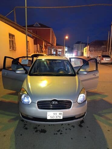 mersedes benz 190: Hyundai Accent: 1.5 l | 2007 il Sedan — 4