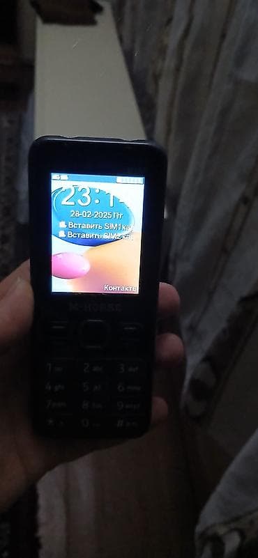 M-HORSE M150 düyməli mobil telefon Xüsusiyyətlər: - 2 SIM dəstəyi