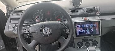 b6: Volkswagen Passat: 2 l | 2005 il Sedan — 6