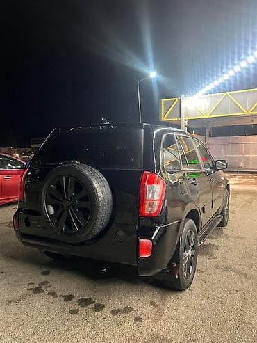ravon r4 lizing: Chery Tiggo (T11): 1.9 l | 2013 il — 5