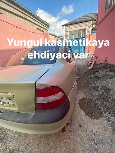 kia optima 2013: Opel Vectra: 1.8 l | Sedan — 5