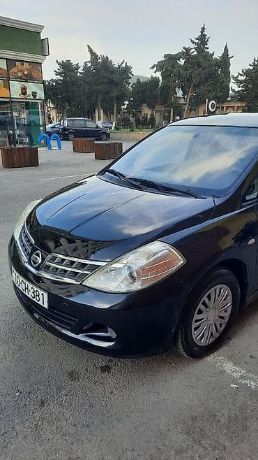 niva bar: Nissan Tiida: 1.5 л | 2011 г. Хэтчбэк — 5