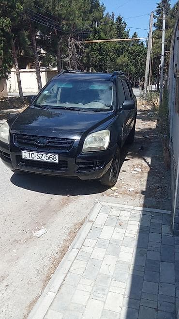 kia k3: Kia Sportage: 2 l | 2006 il Ofrouder/SUV — 3