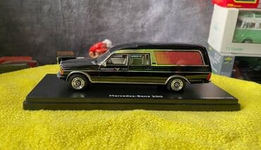 metbex tavan modelleri: Коллекционная модель Mercedes-Benz 200 W123 Hearse black 1982 Schuco — 15