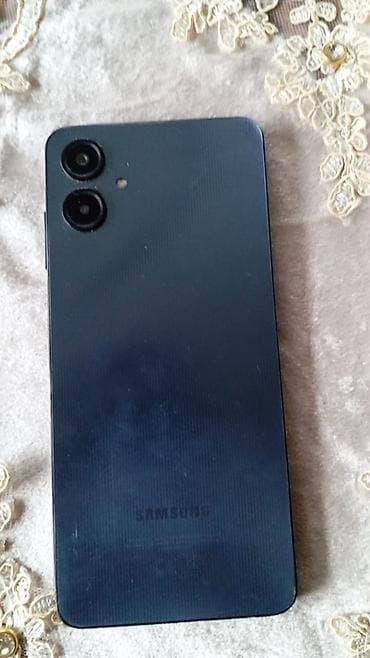 ses guclendirici satilir: Samsung Galaxy A06, 128 GB, rəng - Mavi, Qırıq — 1