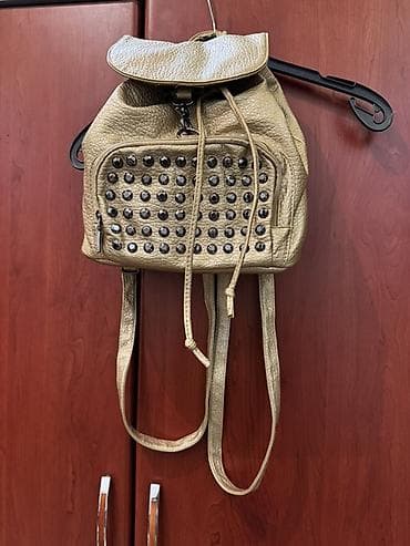 Велосипеды: - Qadın üçün 2 ədəd çanta dəsti 1) Qızılı rəngdə mini bel — 1