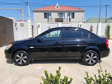 multi sukan: Hyundai Accent: 1.4 l | 2008 il Sedan — 5