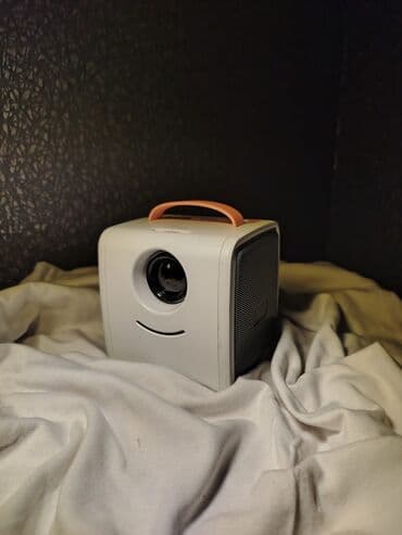 Smart TV bokslar: Yeni Portativ Proyektor Ünvandan götürmə — 1