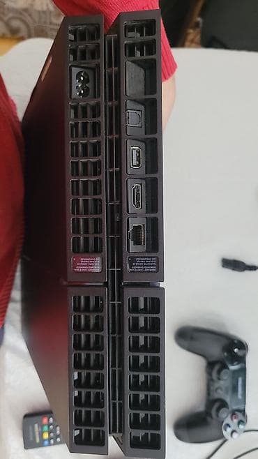 iphon 13 pro max: PlayStation 4 (PS4) 1tb İdeal veziyyetdedir heç bir problemi yoxdur — 2