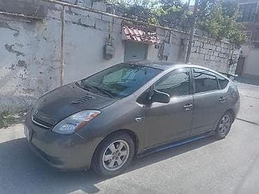 Toyota Prius (ikinci nəsil) hibrid hatchback - Gümüş-boz rəng -