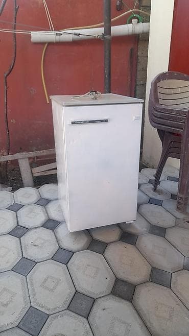 Kompakt birkameralı soyuducu - Rəng: ağ - Önündə üstdən açılan qapı