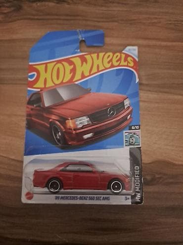 Монеты: Hot Wheels – ’89 Mercedes‑Benz 560 SEC AMG miqyaslı model avtomobil — 2
