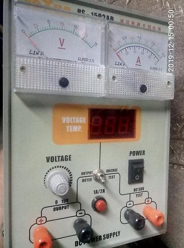 Qida bioku.PS1502AD 1 v dan 15 v qeder artirmaq olur. 0 ma den 2 A — 3