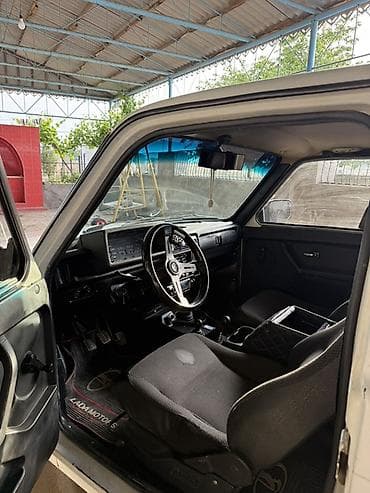 opel vectra b: LADA Niva 4x4, ağ rəngli, 3 qapılı off-road SUV. Xüsusiyyətlər və — 8
