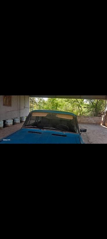 uc təkərli: Model: Lada (VAZ) 2106 sedan Kuzov: 4 qapı, mavi rəng Yürüş — 2
