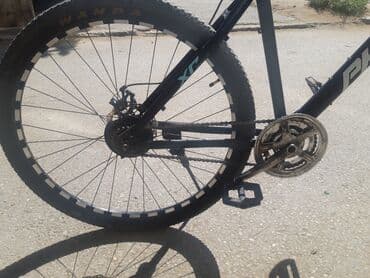 PHAIDAT markalı, qara rəngdə dağ velosipedi. Həm ön, həm də arxa