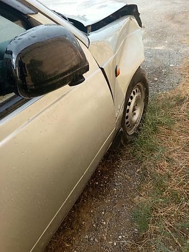 e39 oturacaq: Avtomobil: Daewoo Nexia (sedan), gümüşü rəng Kuzov: 4 qapı, arxa — 7