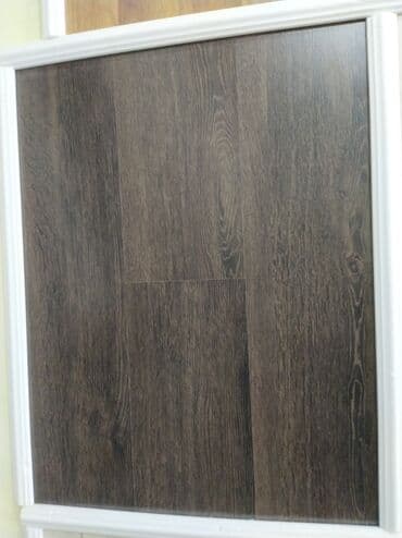 parket qiymətləri 2019: Qəhvəyi rəngli, taxta görünüşlü laminat döşəmə paneli. Ev və ya ofis — 1