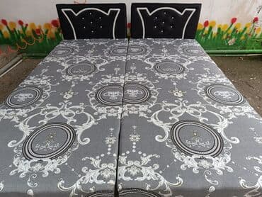 İkinəfərlik çarpayı