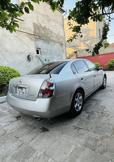 reno 12 toros: Nissan Altima: 2.5 l | 2004 il Sedan — 6