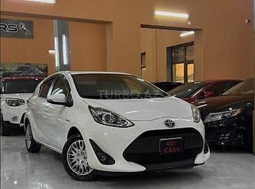 hibrid: Toyota Aqua (Prius C) hibrid hetçbek icareye verilir depozit 200 man — 1
