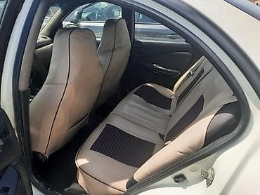 megan 3: Nissan Sunny: 1.3 l | 2006 il Sedan — 4