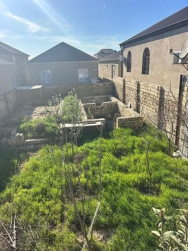 gence emlak: Torpaq sahəsi və yardımçı tikili - Şəxsi həyətyanı sahə, daş hasarla — 1