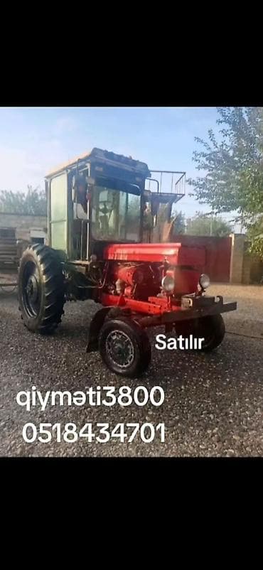 Kənd təsərrüfatı traktoru – kabinalı, dizel mühərrikli. - Ön kapot
