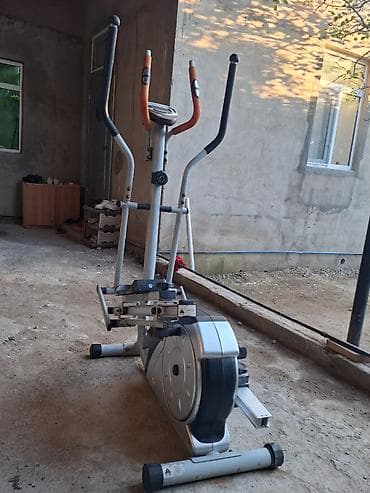 İdman və istirahət: Qacis trenajoru.ayaq ve qolıarı hereket etdirmek ucundur — 2
