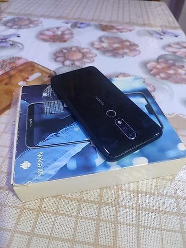 printer 3 u birində: Nokia X6, rəng - Qara, Barmaq izi — 5
