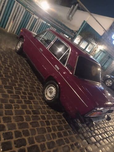 175 70 13 təkər: VAZ 2106 sedan - Kuzov: 4 qapılı, tünd bordo rəng. Xrom yan — 2