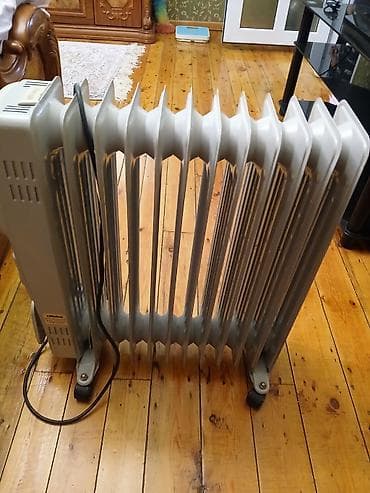 kohne kondisioner aliram: Nobel yağlı radiator – 11 seksiyalı, təkərlər üzərində mobil dizayn — 1