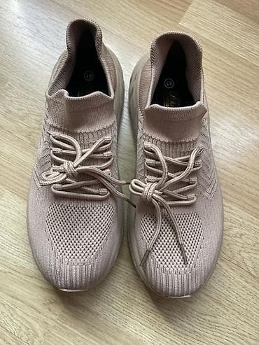 Təsviri: - Rəng: açıq bej - Model: nəfəsalan trikotaj üstlü idman