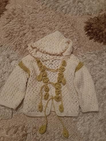 Toxuma əl işi. Uşag jaketi temiz pambig sapla tuxunub. Cox