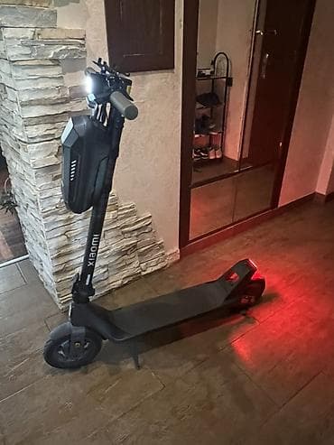 electro gitara: Xiaomi elektrik skuter. Şəkillərdə qara rəngli, minimalist dizayna — 7