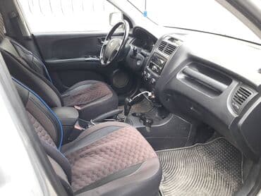 e 124: Kia Sportage – gümüşü rəngdə kompakt krossover/SUV Xüsusiyyətlər: - — 5