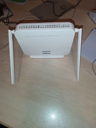 nar modem: Nokia Wi‑Fi router - Model: Nokia (üzərində “Nokia” loqolu, iki — 1